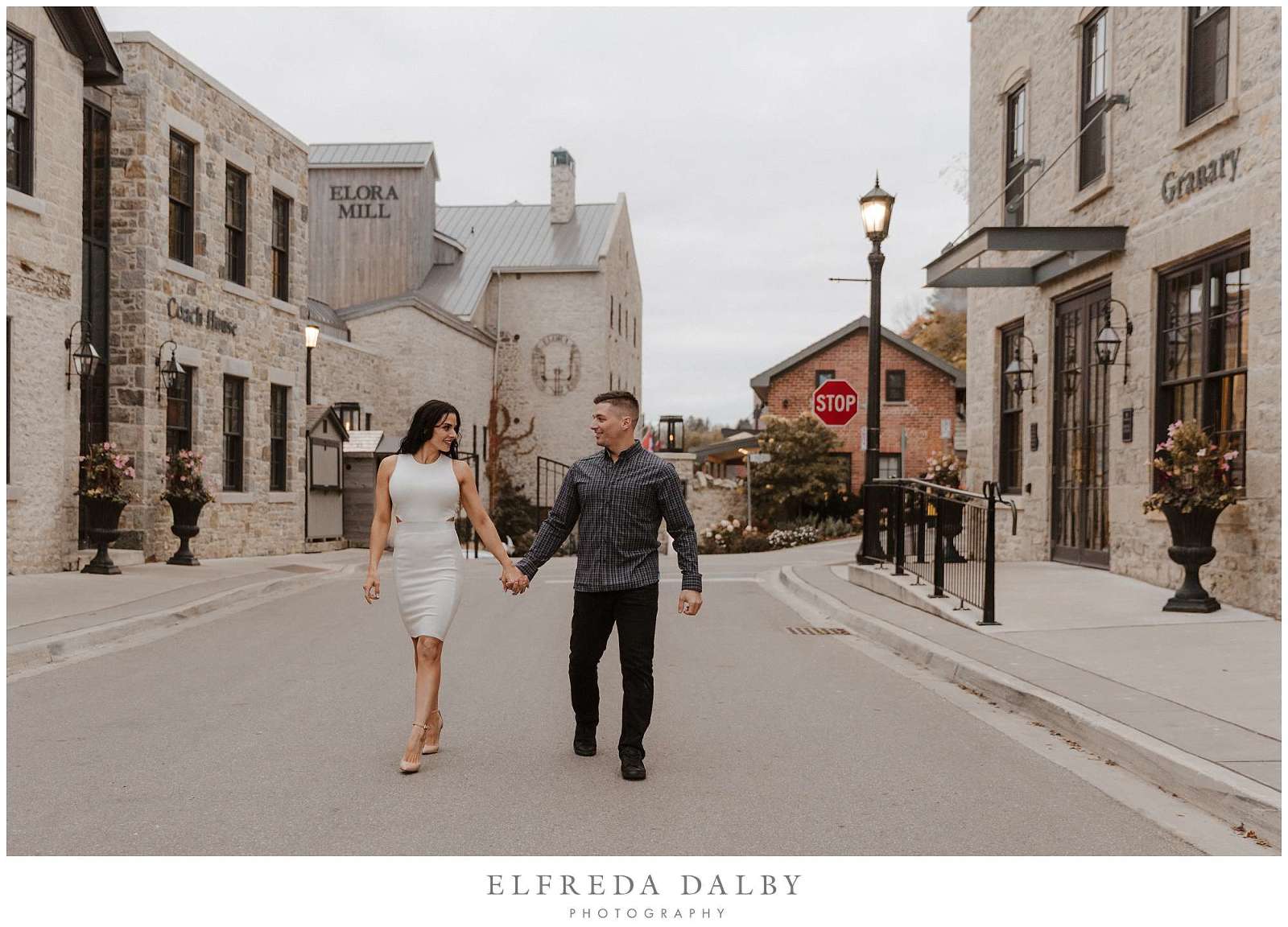 Couple walking down the road at the Elora Mill