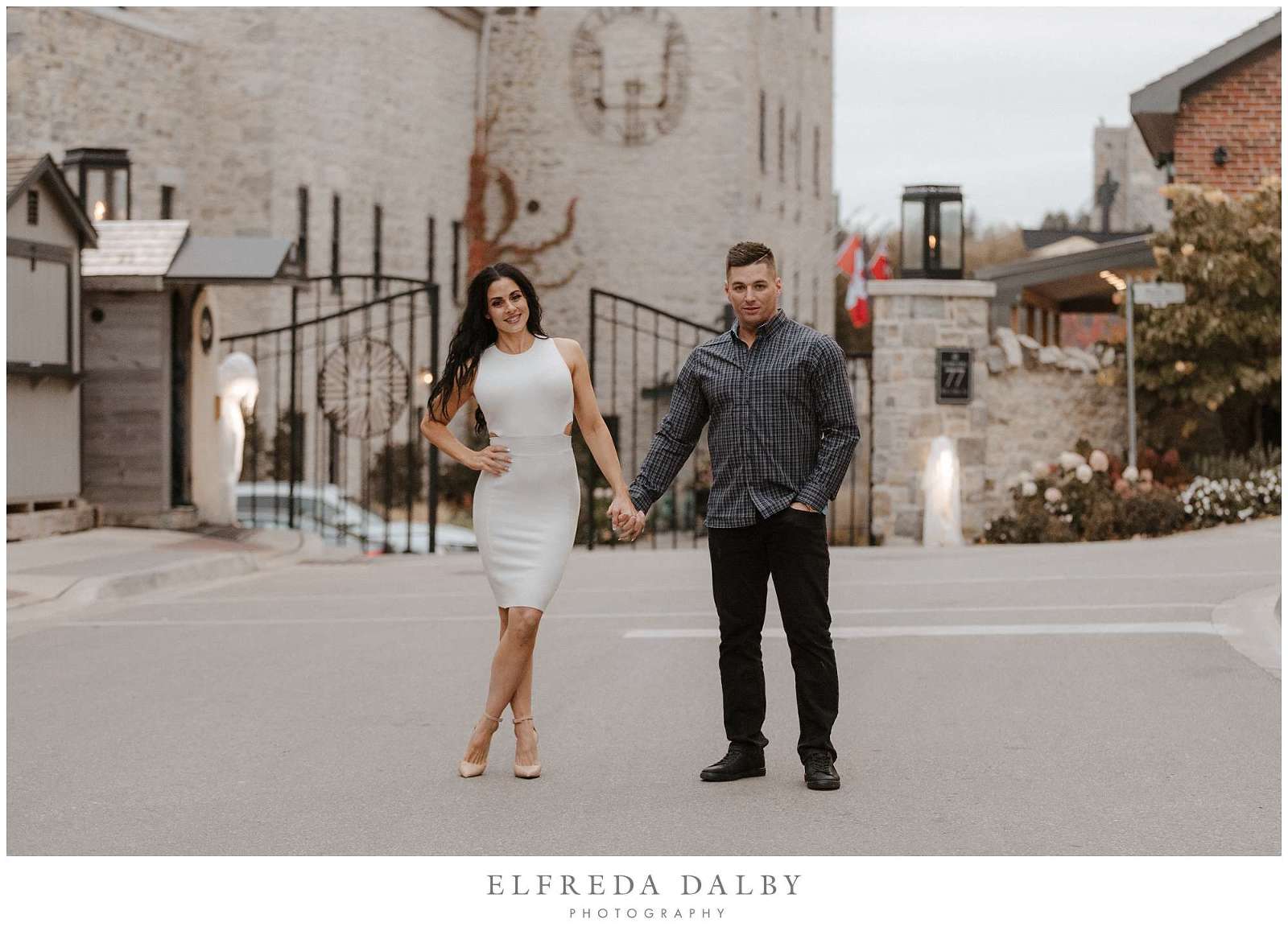 Gorgeous couple in front of the Elora Mill
