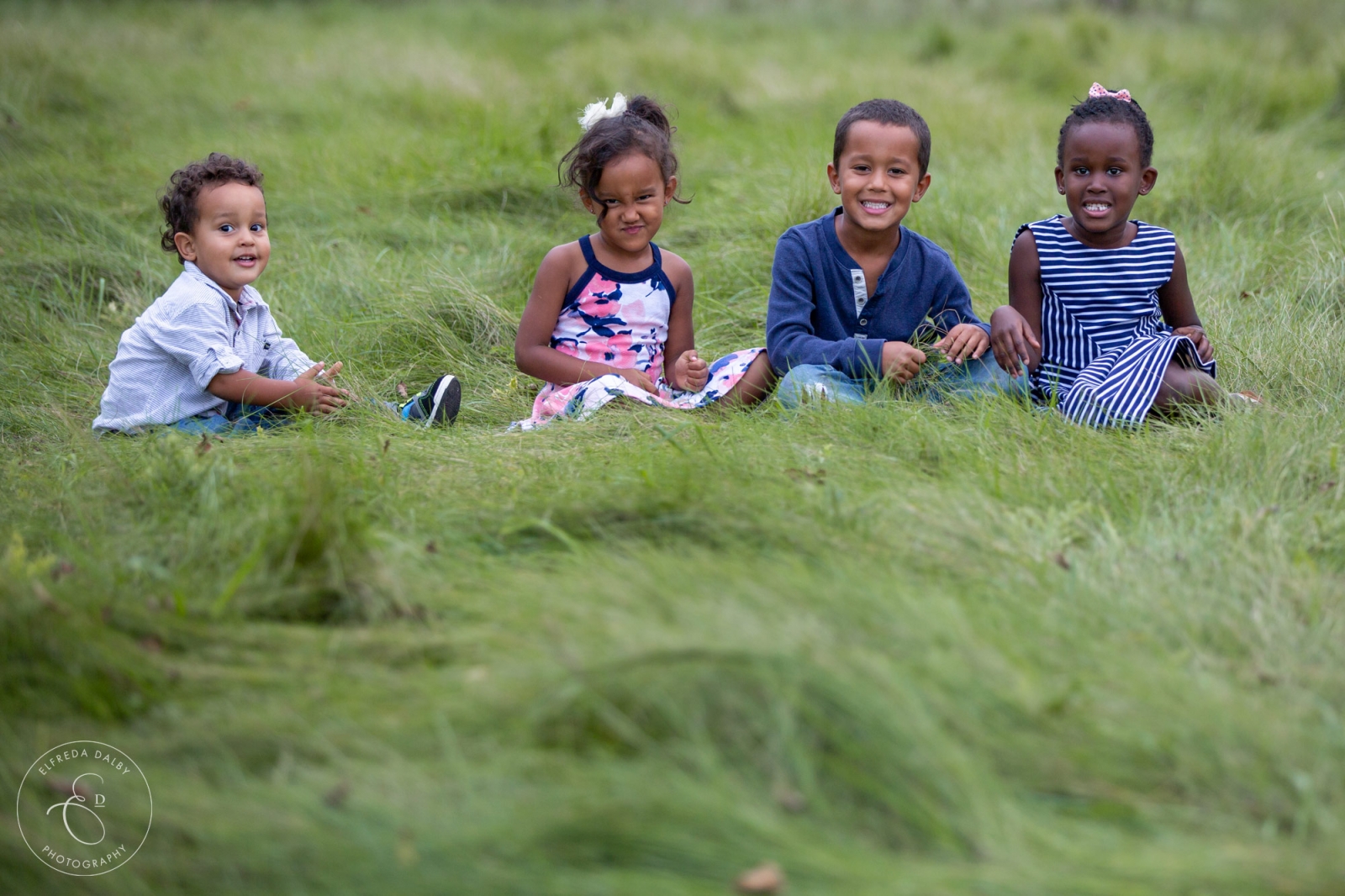 Fall kids photos sitting in grass