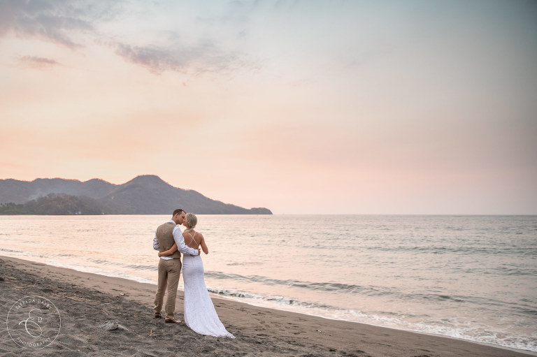 Romantic couple on the beach during sunset in Costa Rica