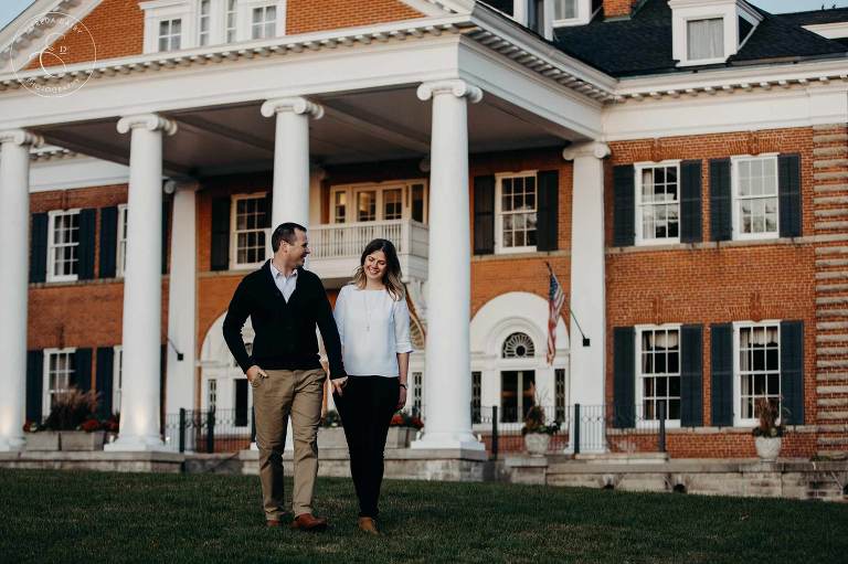 Engaged couple walking in front of Langdon Hall