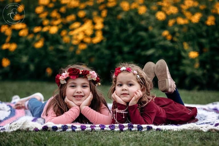 Girls lying on the grass