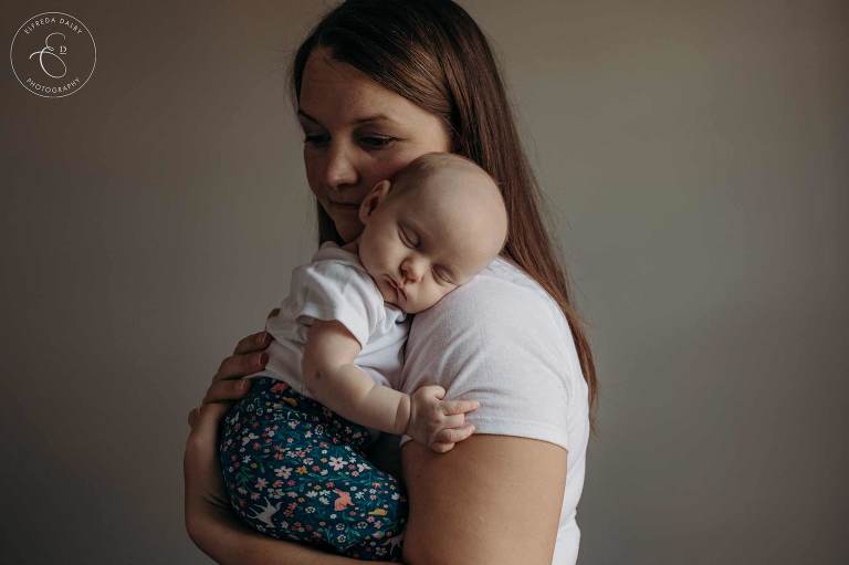 Mother holding newborn baby