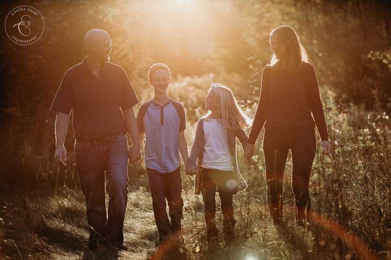 Family walking together during golden light