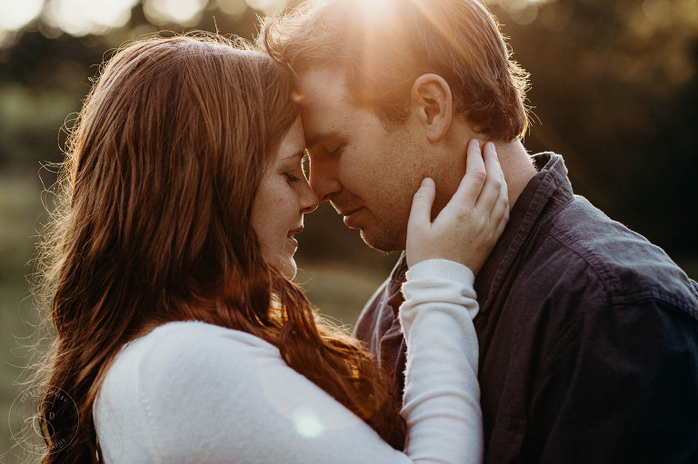 a close up of couple during golden hour