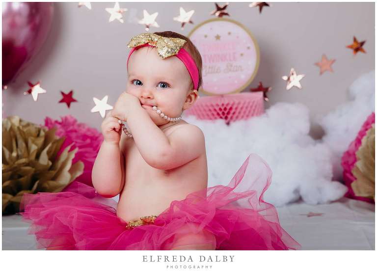 Cute baby girl with her pearl neckless