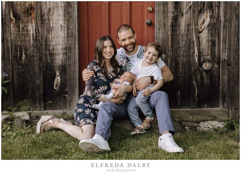 Beautiful happy family sitting together