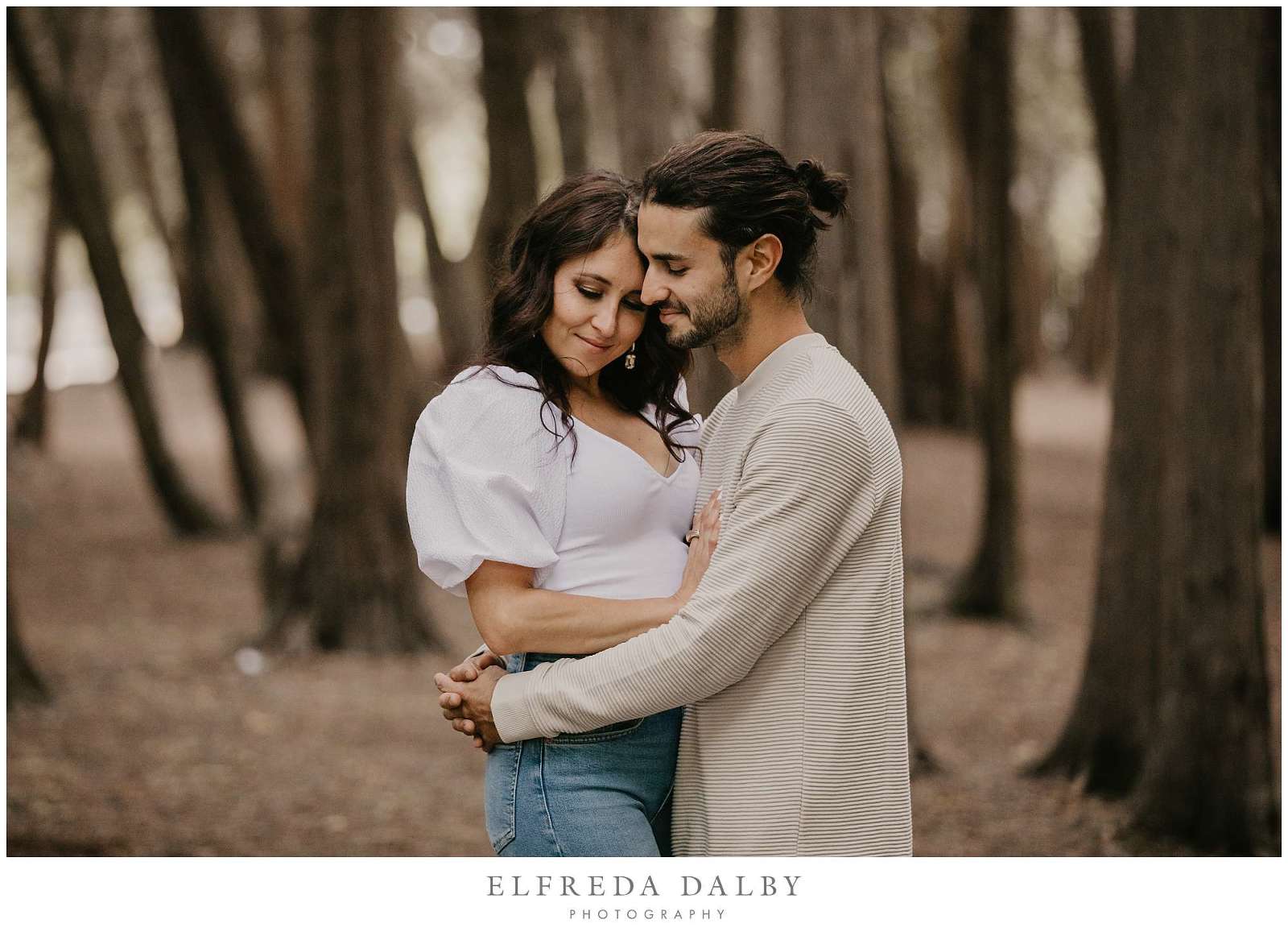 Romantic engaged couple in the woods in Elora