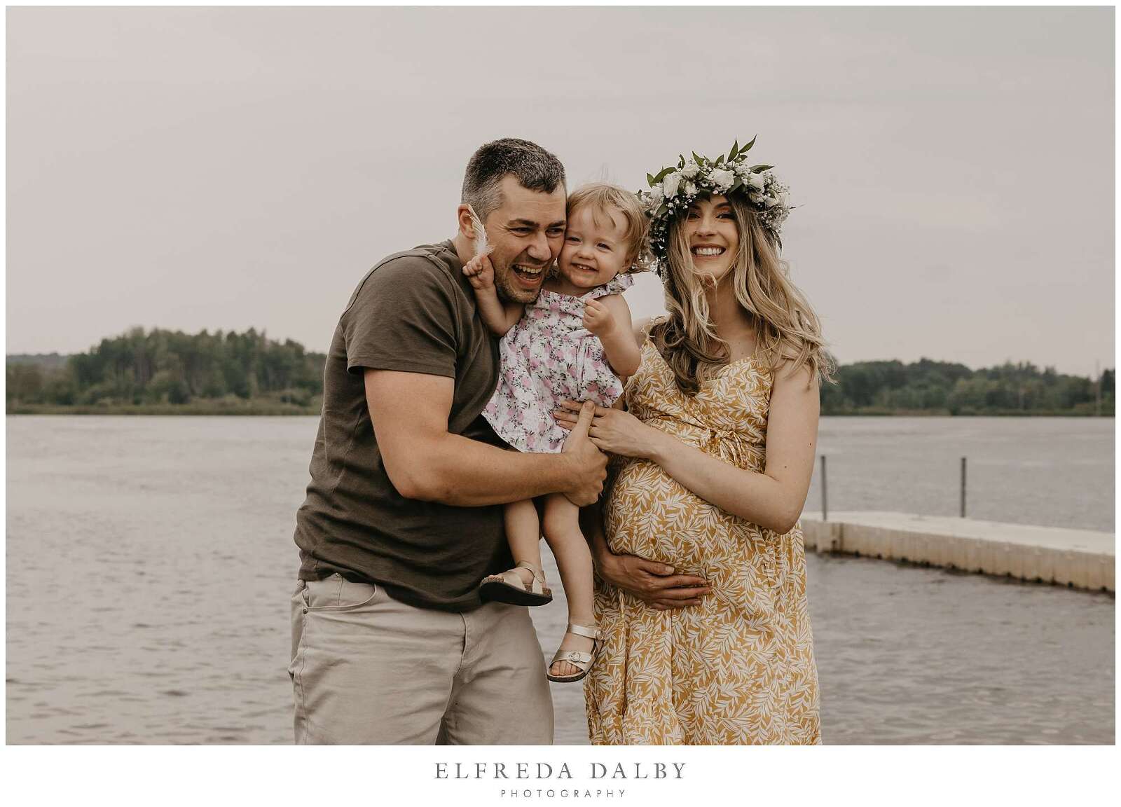 Happy family at the water