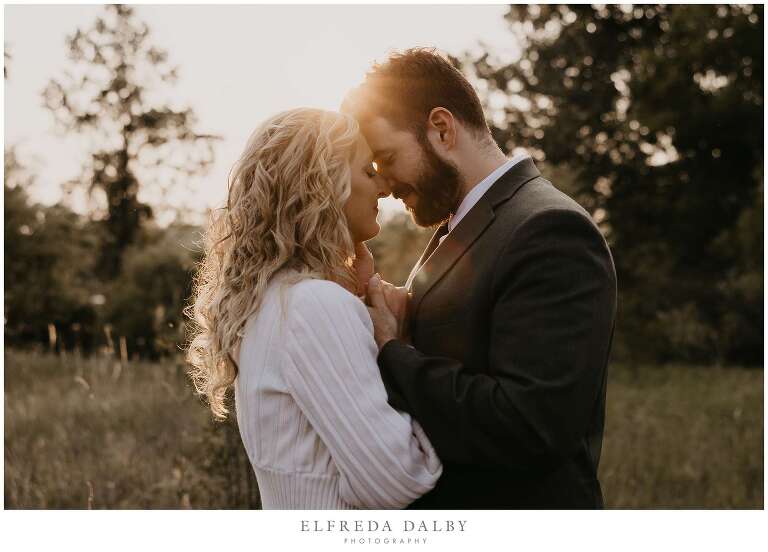 Sunset kiss between a gorgeous couple