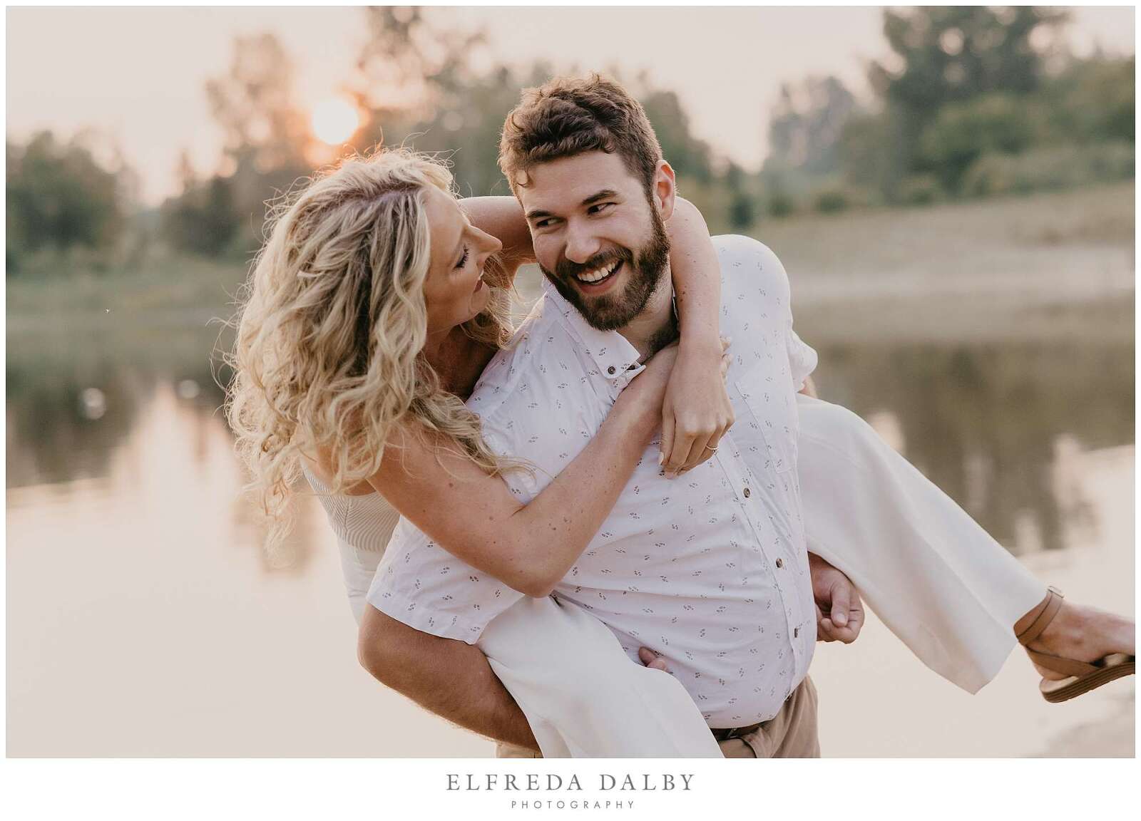 Man piggy back his beautiful fiancée.