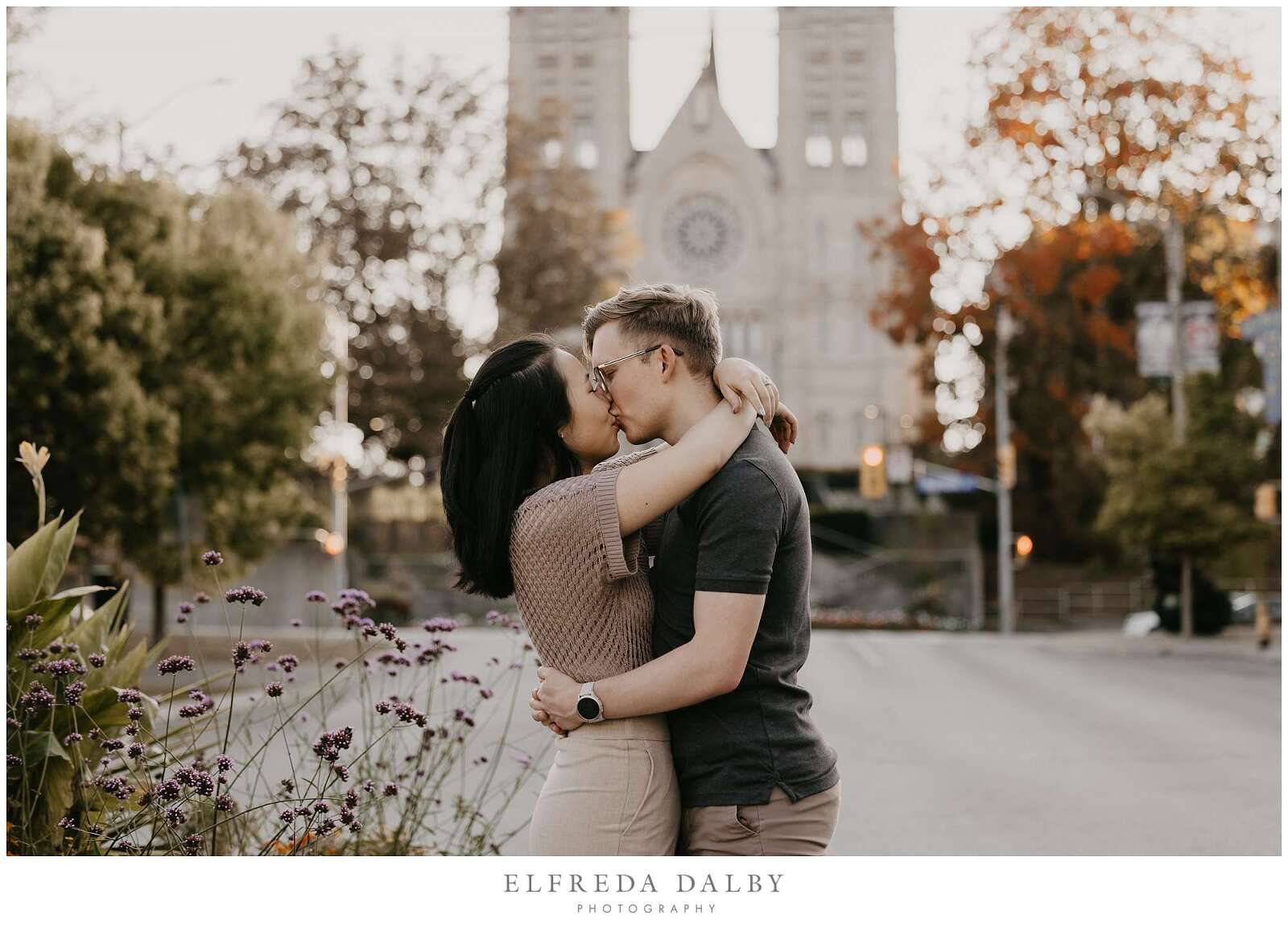 Couple kissing in the middle of the road in Guelph