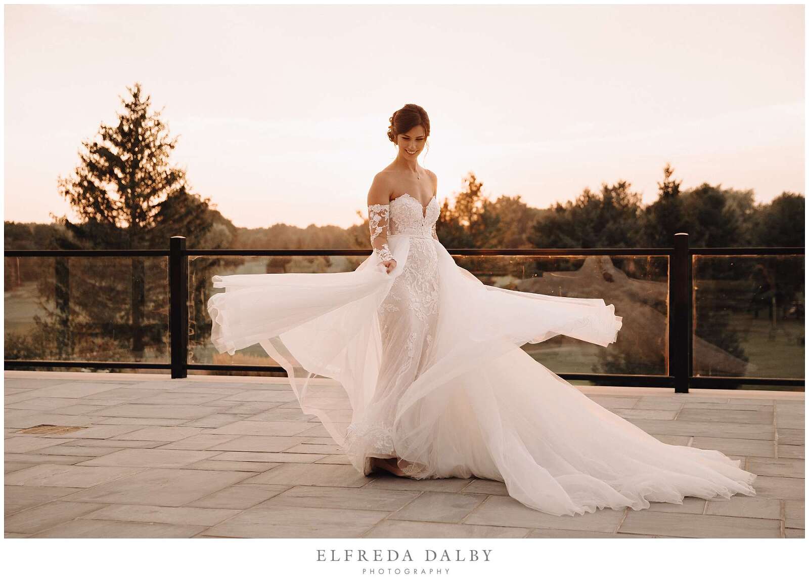Bride playing with her wedding dress at Monthill Country Club