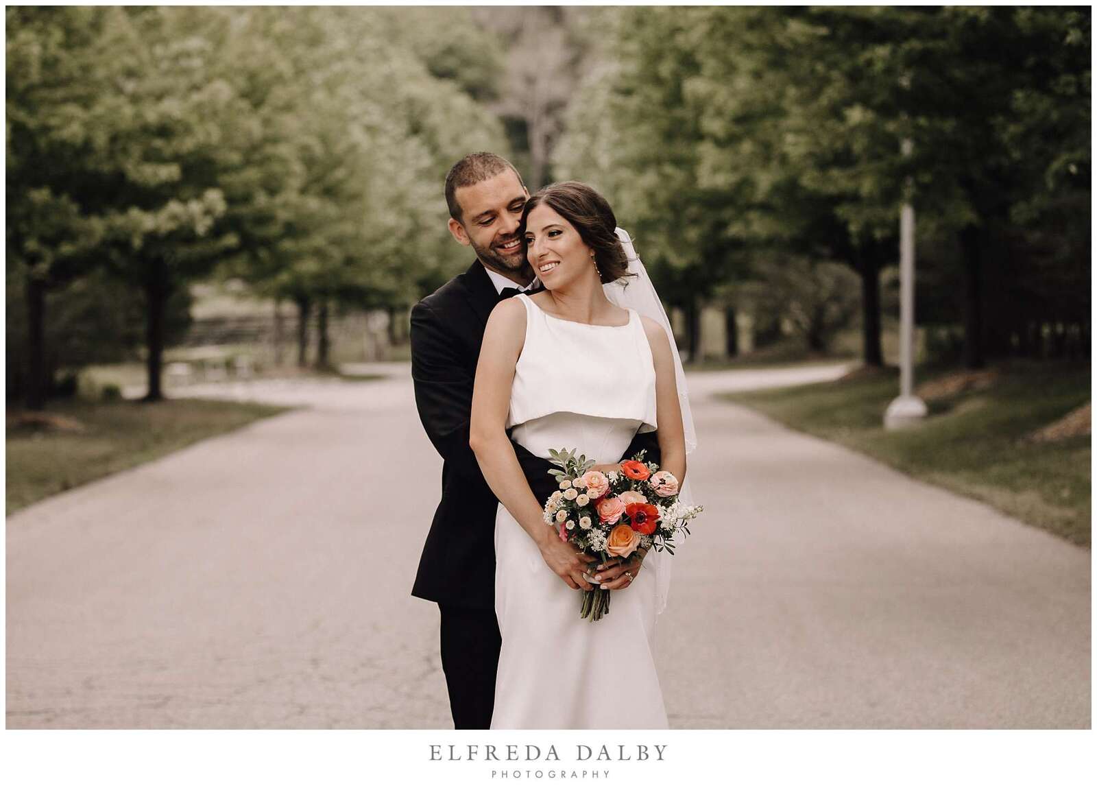 Bride and groom standing in the road at Hockley Valley Resort in Mono