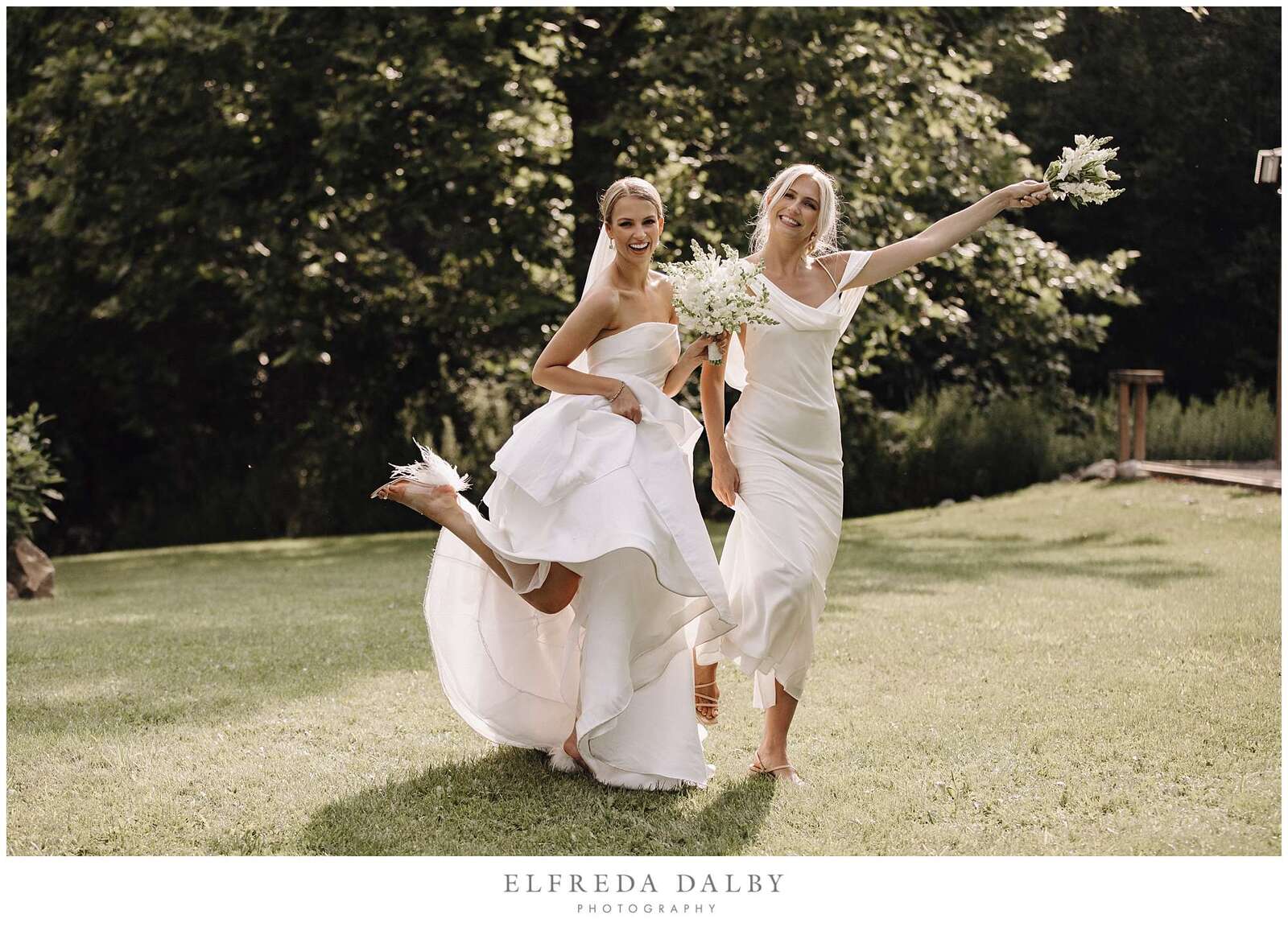Bride and her bridesmaid having fun