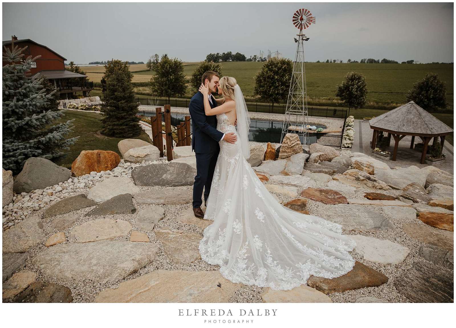 Bride and groom kissing at Maple Lane Haven