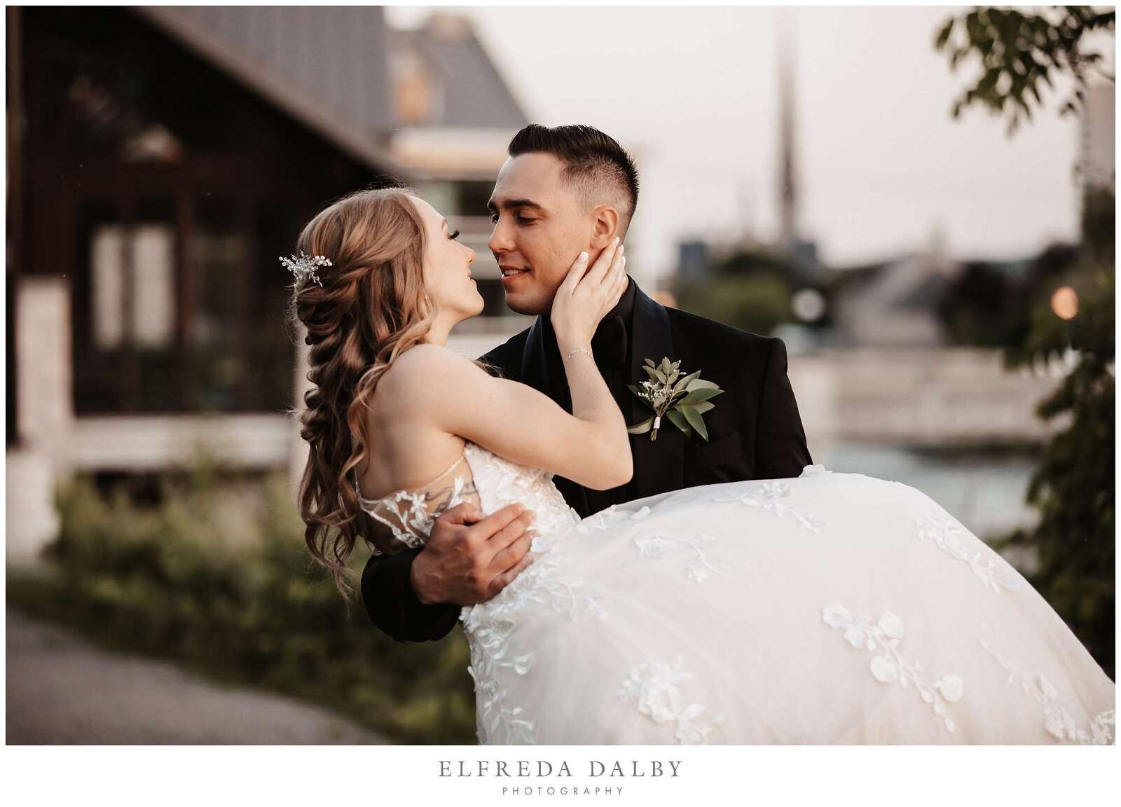 Groom holding his bridge at Cambridge Mill